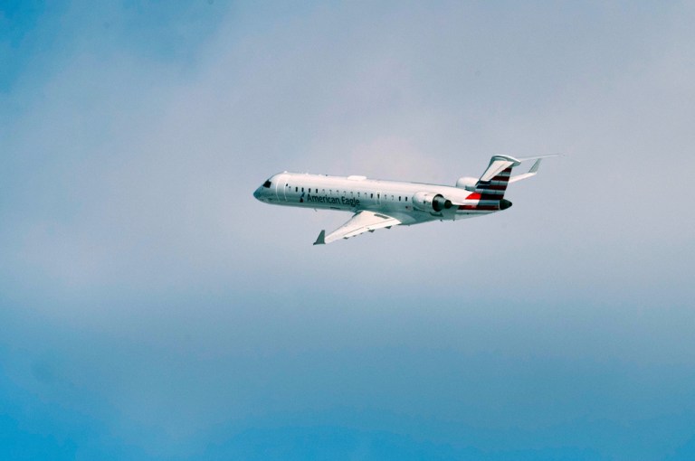 An American Eagle plane takes off at Ronald Reagan Washington National Airport, on the anniversary of the Potomac River mid-air collision between an American Airlines passenger plane and an Army Blackhawk helicopter, Thursday, Jan. 29, 2026, in Arlington, Va. (AP Photo/Cliff Owen)