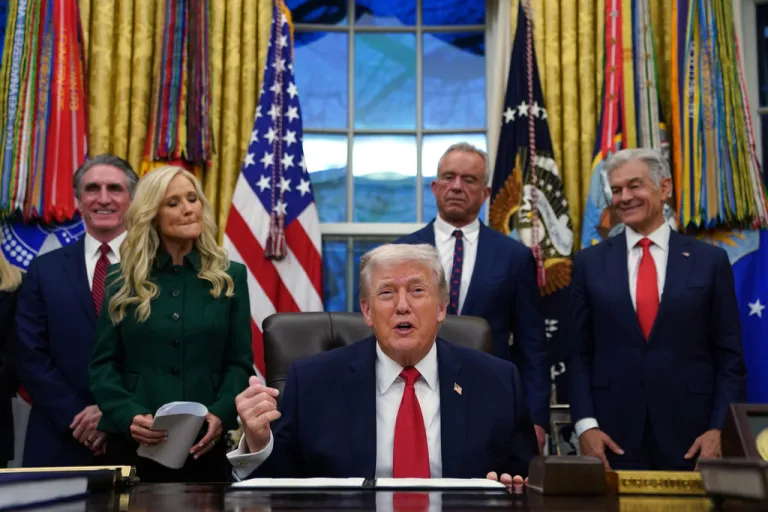 President Donald Trump speaks before signing an executive order on addiction recovery in the Oval Office of the White House, Thursday, Jan. 29, 2026, in Washington, as from left Interior Secretary Doug Burgum, Kathryn Burgum, Health and Human Services Secretary Robert F. Kennedy Jr. and Centers for Medicare & Medicaid Services administrator Dr. Mehmet Oz watch.