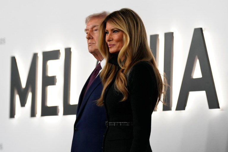 President Donald Trump and first lady Melania Trump arrive for the premiere of her movie 