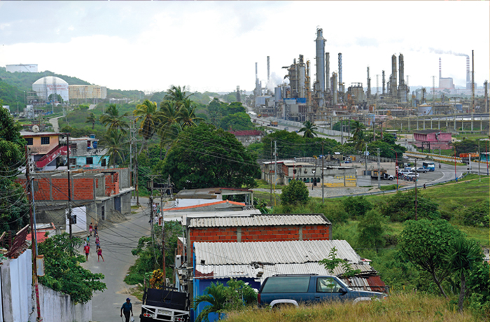 The El Palito refinery rises above Puerto Cabello, Dec. 2025. (Matias Delacroix/AP)