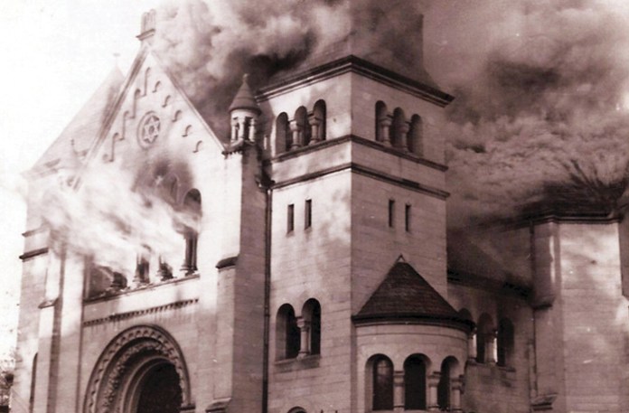 A synagogue burns in Baden-Baden, Germany, Nov. 9, 1938. (Universal History Archive/Universal Images Group/Getty)