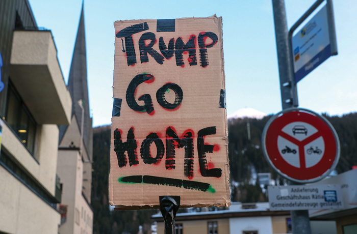 A protest against President Donald Trump’s visit to the World Economic Forum in Davos, Switzerland, Jan 18, 2026. (Krisztian Bocsi/Blooomberg/Getty)