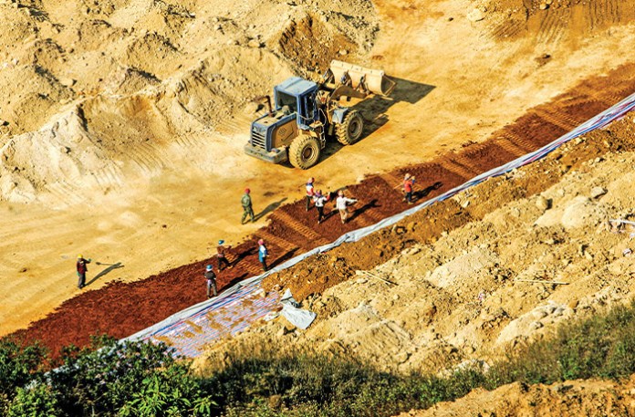 Workers mine rare earth metals in southwest China’s Yunnan Province, March 18, 2008. (Imagine China / Newscom)