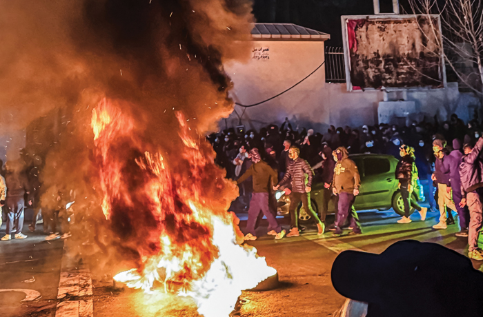 Iranians gather while blocking a street during a protest in Tehran, Iran on Jan. 9, 2026. (MAHSA/Middle East Images/AFP via Getty Images)