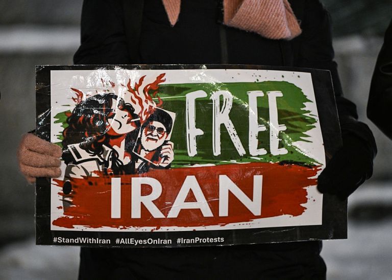 Members of the Iranian diaspora, their supporters, local activists, and passersby hold a symbolic demonstration titled 'Free Iran' to show solidarity with Iranian women and men fighting for freedom and civil rights, in Krakow's Market Square in Krakow, Poland, on January 15, 2026. (Photo by Artur Widak/NurPhoto via Getty Images)