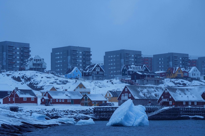 Ice floats on the sea off the coast of Nuuk, Greenland.