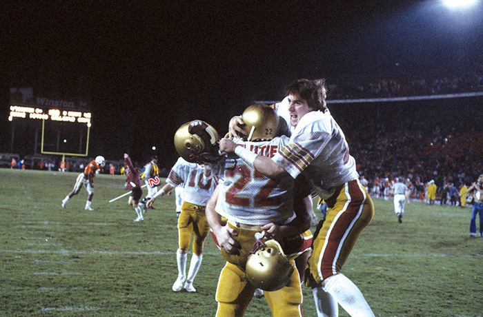 Boston College quarterback Doug Flutie (22) celebrates with his brother, Darren, after throwing a game-winning Hail Mary touchdown vs Miami on Nov. 23, 1984. (Heinz Kluetmeier /Sports Illustrated via Getty Images)