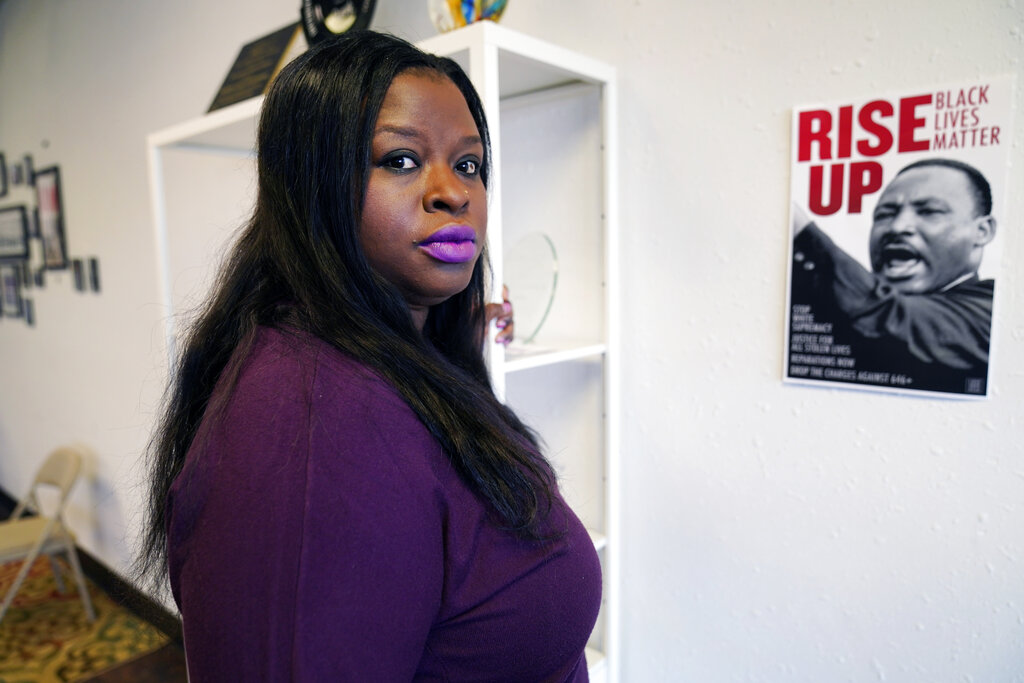 Arrested ringleader of anti-ICE church protest asks court to return cellphone