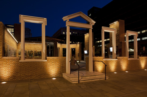 President's House Site exhibit, night view The home was demolished in 1832; today, a low brick wall and architectural elements evoke the feeling of a house. The exhibit is outdoors and can be viewed until 10 p.m. (NPS photo. Photograph by Joseph E.B. Elliott.)