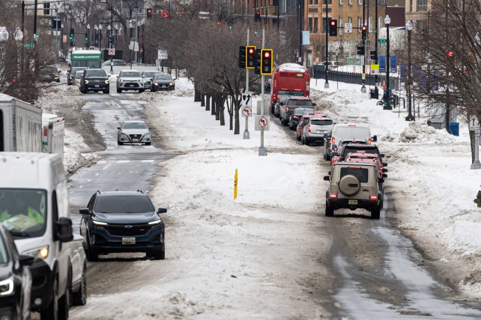 Washington, D.C. residents grapple with poor road conditions caused by winter storm. (Credit: Graeme Jennings)