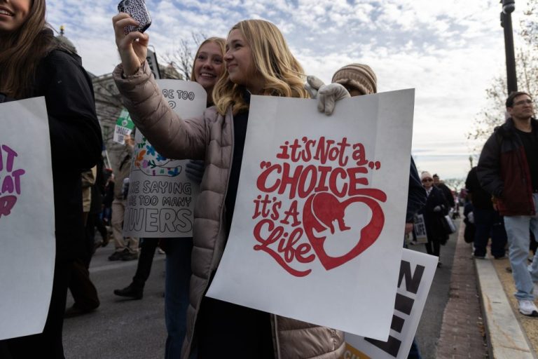 Anti-abortion activists march near the U.S. Capitol during the annual March for Life rally on January 23, 2026, in Washington, D.C. Anti-abortion activists attended the annual march to mark the anniversary of the Supreme Court's, now-overturned, 1973 Roe v. Wade ruling that legalized abortion in all 50 states.