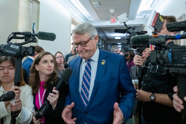 Rep. Rick Allen surrounded by press
