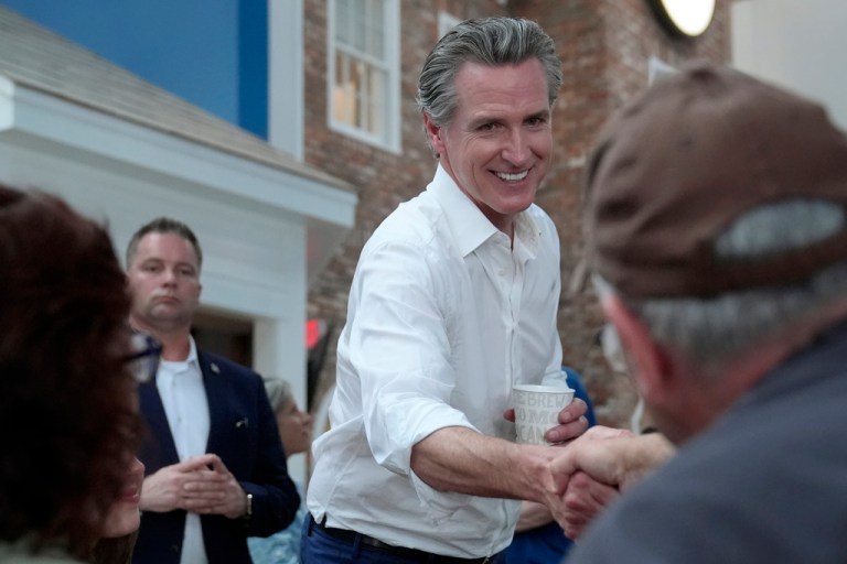 California Gov. Gavin Newsom greets people in Hooksett, New Hampshire, in July 2024.