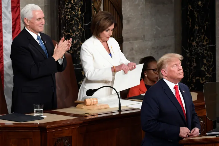 House Speaker Nancy Pelosi of California, tears her copy of President Donald Trump's State of the Union address.