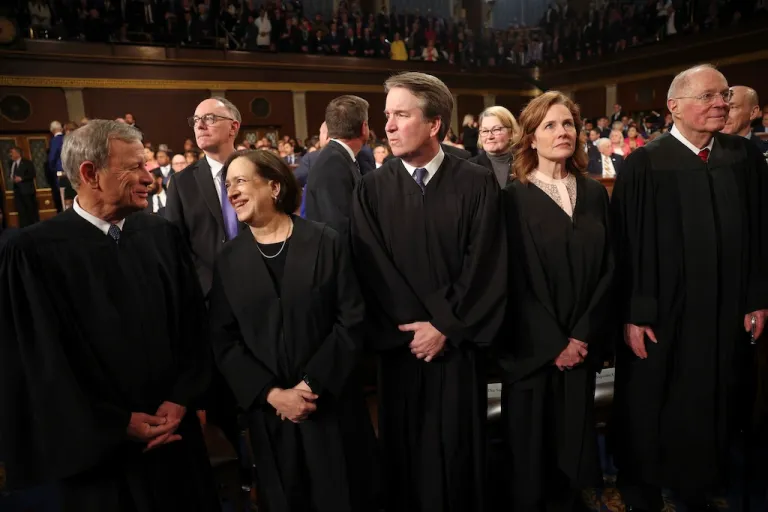 From left, Chief Justice of the Supreme Court John Roberts, Justice Elena Kagan, Justice Brett Kavanaugh, Justice Amy Coney Barrett, and retired Justice Anthony Kennedy are seen before President Donald Trump addresses a joint session of Congress at the Capitol in Washington, Tuesday, March 4, 2025. (Win McNamee/Pool Photo via AP)