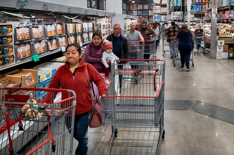 FILE - Customers wait in line for eggs at a Costco store in the Van Nuys section of Los Angeles on Wednesday, Feb. 19, 2025.