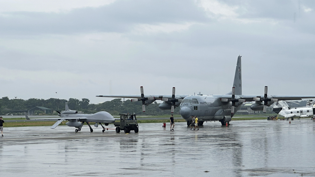 US military plane hits road barrier during Philippine training, injuring five personnel
