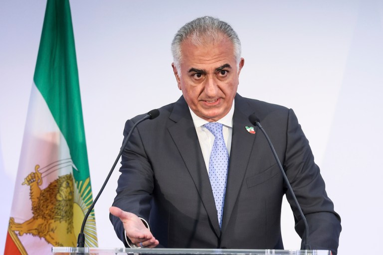 Reza Pahlavi, the son of Iran's toppled Shah Mohammad Reza Pahlavi, speaks during a press conference, Monday, June 23, 2025 in Paris. (AP Photo/Thomas Padilla)