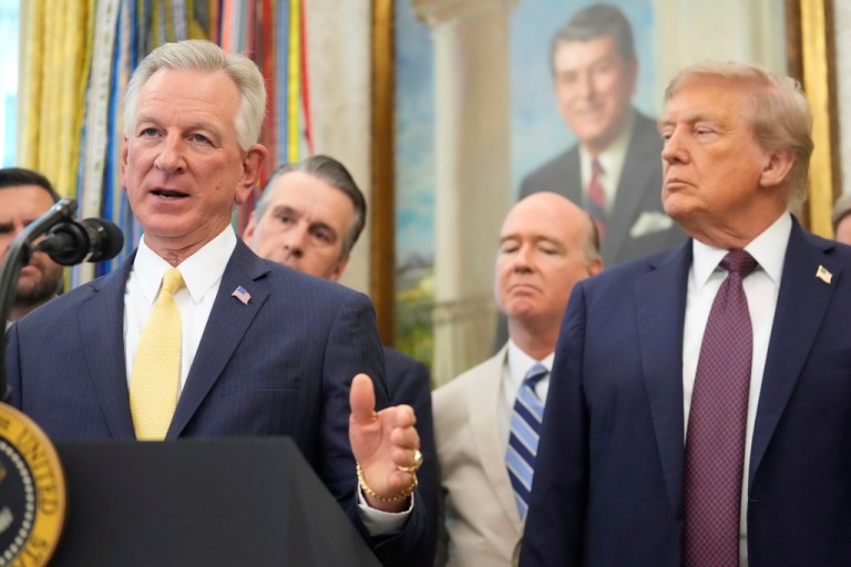 President Donald Trump listens as Sen. Tommy Tuberville, R-Ala., speaks during an event in the Oval Office of the White House, Tuesday, Sept. 2, 2025, in Washington. (AP Photo/Mark Schiefelbein)