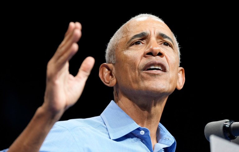 Former President Barack Obama, gestures during a rally for Virginia Democratic gubernatorial candidate Abigail Spanberger