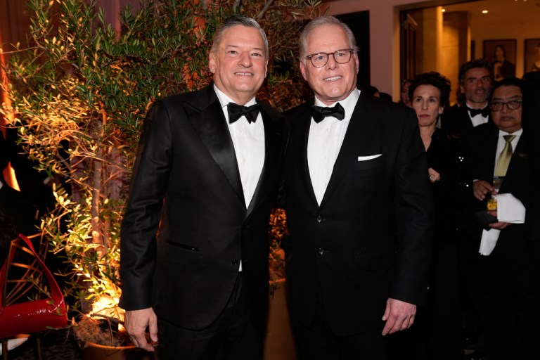 Ted Sarandos, CEO of Netflix, and David Zaslav, CEO and President of Warner Bros. Discovery.