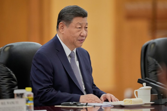 Chinese President Xi Jinping speaks during a meeting with British Prime Minister Keir Starmer in Beijing.
