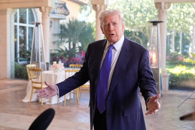 President Donald Trump speaks to reporters at his Mar-a-Lago club, Sunday, Feb. 1, 2026, in Palm Beach, Fla. (AP Photo/Mark Schiefelbein)