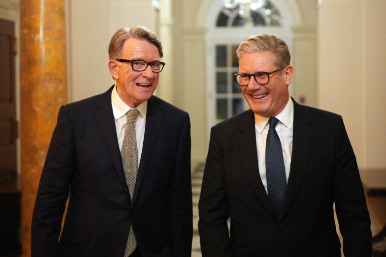Lord Peter Mandelson walks with Prime Minister Keir Starmer at the ambassador's residence in the United States