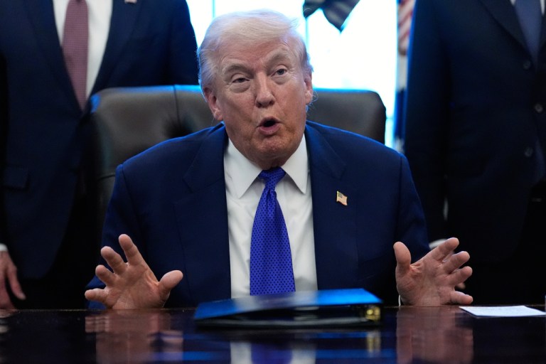 President Donald Trump speaks in the Oval Office of the White House.