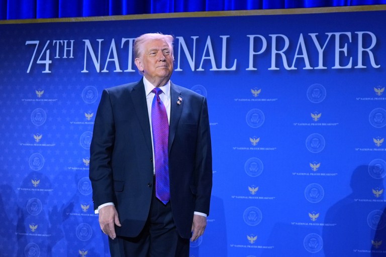 President Donald Trump arrives to speak to the National Prayer Breakfast
