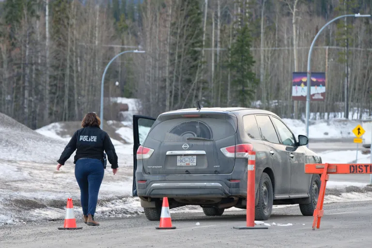 Police work the scene near Tumbler Ridge Secondary School