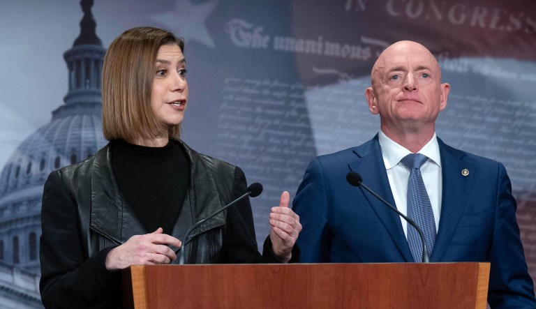 Rep. Elissa Slotkin (D-MI) and Sen. Mark Kelly (D-AZ) speak during a news conference on Capitol Hill.