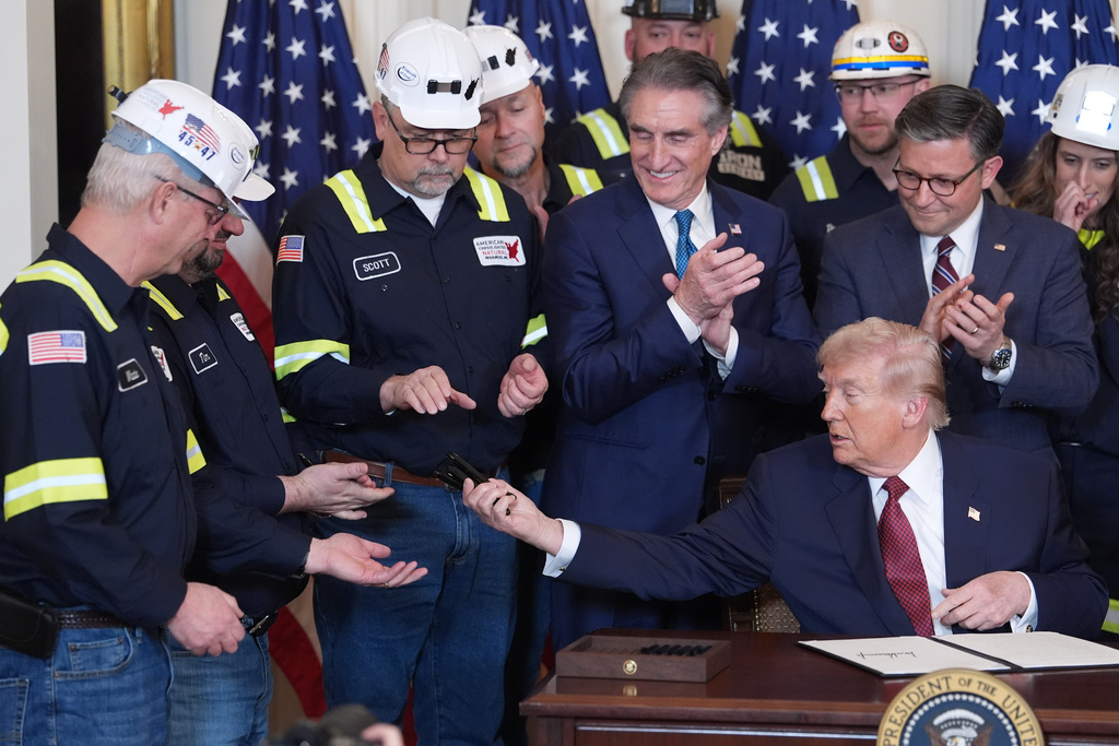 Trump signs executive order for long-term federal purchases of coal power