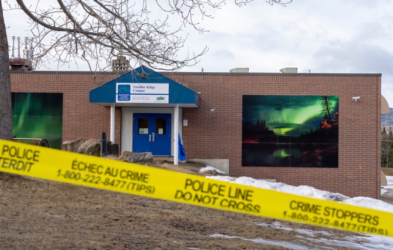 Police tape surrounds a school in Tumbler Ridge, British Columbia, Canada, after Tuesday's mass shooting.
