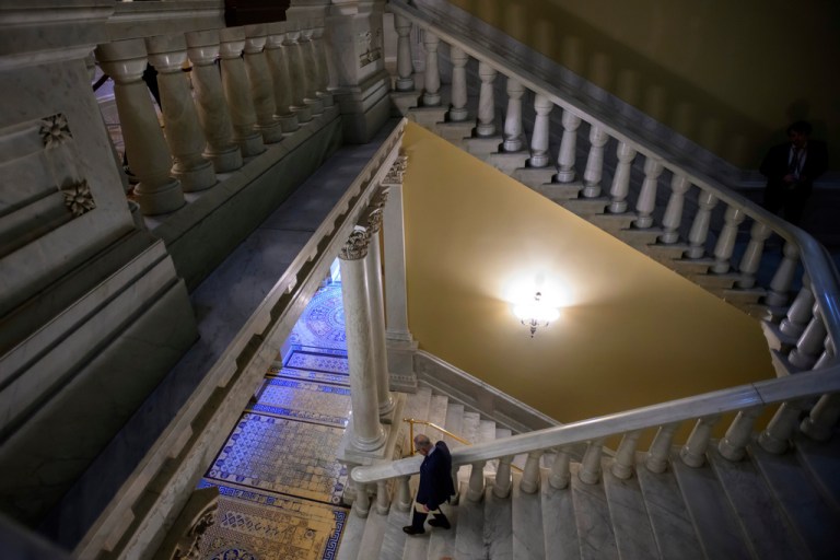 Senate Minority Leader Charles Schumer, D-N.Y., departs a news conference at the Capitol, Thursday, Feb., 12, 2026, in Washington
