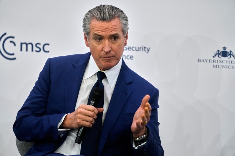 Gov. Gavin Newsom (D-CA), center, addresses the audience at the Munich Security Conference in Munich, Germany.