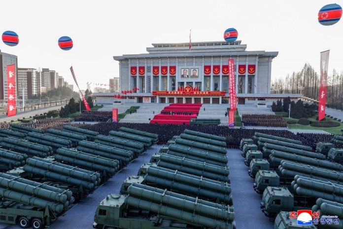 A military parade drives through the streets of Pyongyang