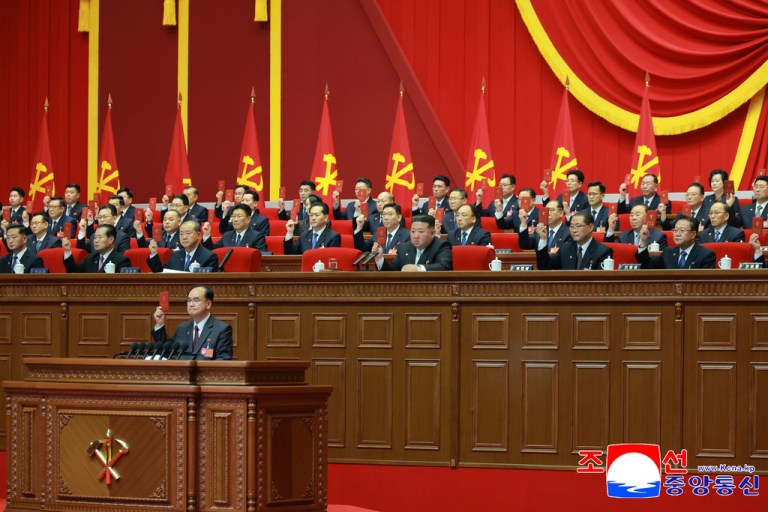 Kim Jong Un sits surrounded by high-ranking Workers' Party leaders at the congress in Pyongyang