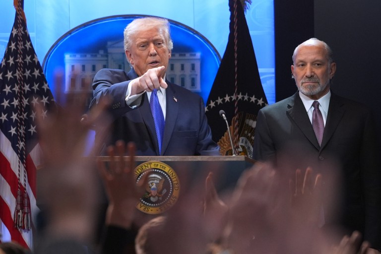President Donald Trump points to a reporter during a press briefing at the White House, Friday, Feb. 20, 2026.