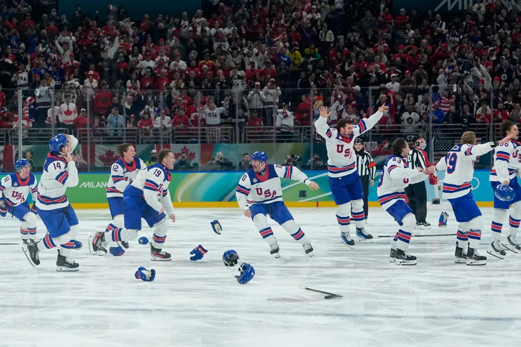 US beats Canada in OT to take home first hockey gold since 1980