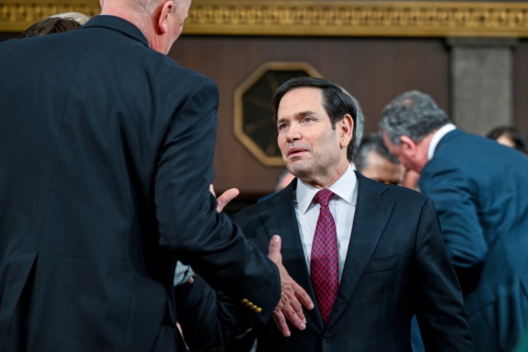 Secretary of State Marco Rubio enters the House Chamber before President Donald Trump delivers the State of the Union address to a joint session of Congress in the House chamber at the U.S. Capitol in Washington, Tuesday, Feb. 24, 2026. (Kenny Holston/The New York Times via AP, Pool)