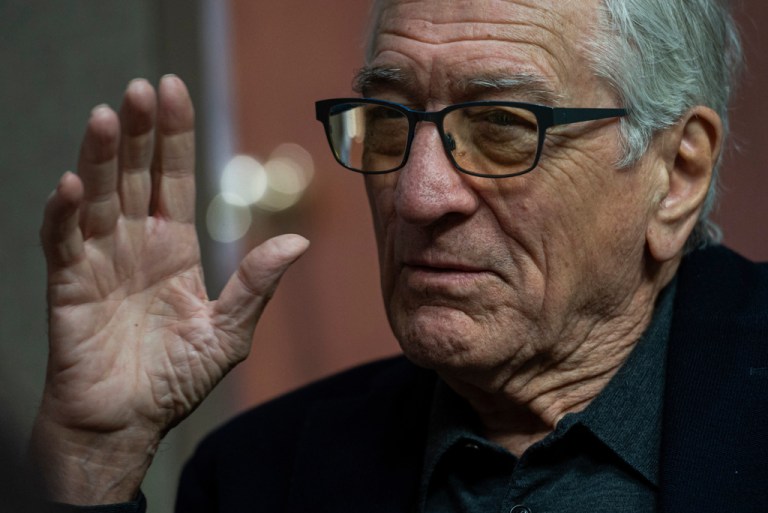 Actor Robert De Niro speaks with a reporter during a rebuttal to President Donald Trump's State of the Union hosted by Defiance.org, the Portland Frog Brigade, and COURIER, at the National Press Club, in Washington, Tuesday, Feb. 24, 2026. (AP Photo/Cliff Owen)