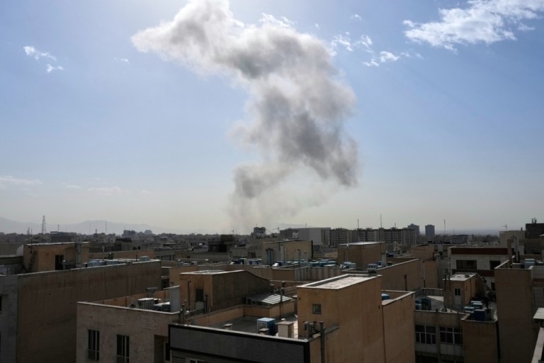 Smoke rises on the skyline after an explosion in Tehran, Iran, Saturday, Feb. 28, 2026.
