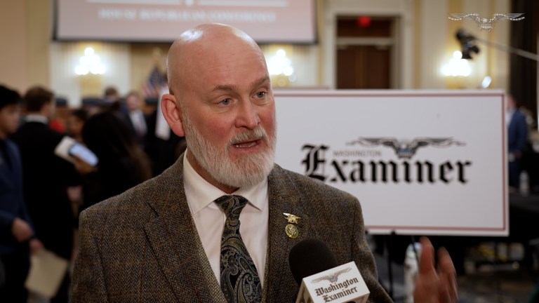 Man talking into microphone