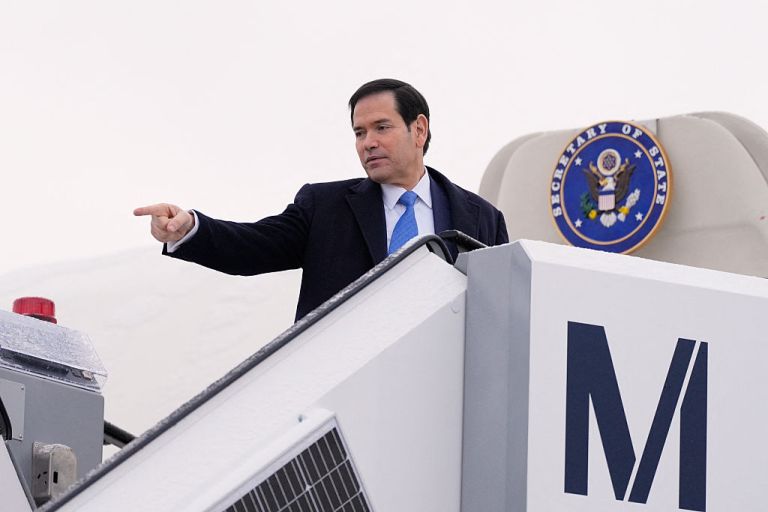 US Secretary of State Marco Rubio points his finger as he departs Munich International Airport in Munich, southern Germany, on February 15, 2026, after attending the Munich Security Conference (MSC). US Secretary of State Marco Rubio sought to reassure a nervous Europe the day before, saying Washington wanted to recharge the transatlantic alliance so a strong Europe could help the United States on its mission of global 