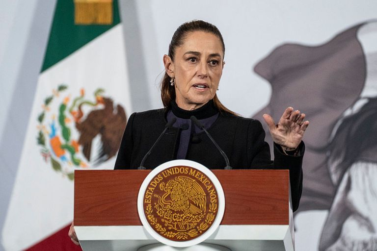 President of Mexico Claudia Sheinbaum Pardo speaks during the daily morning briefing at Palacio Nacional on February 23, 2026 in Mexico City, Mexico. The Secretariat of National Defense of Mexico confirmed that during a security operation in Tapalpa, Jalisco, Nemesio Oseguera Cervantes, known as 'El Mencho', leader of the Jalisco New Generation Cartel, was killed. Mexican authorities confirmed the deaths of over 25 members of the armed forces in different attacks by the Cartel after the operation that killed Oseguera. (Photo by Cristopher Rogel Blanquet/Getty Images)