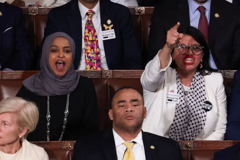 Reps. Rashida Tlaib and Ilhan Omar yell at President Donald Trump during his State of the Union address