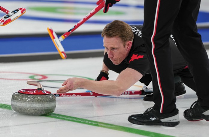 Canada’s Marc Kennedy during the men’s curling round robin against Sweden at the 2026 Winter Olympics in Cortina d’Ampezzo, Italy, on Feb. 13. (Misper Apawu/AP)