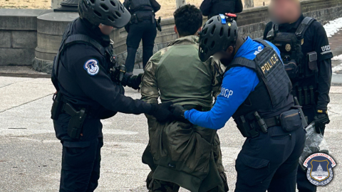 Photo provided by US Capitol Police arresting Carter Camacho, 18, who ran toward the Capitol Building with a shotgun on Feb. 17, 2026. (Photo: US Capitol Police)
