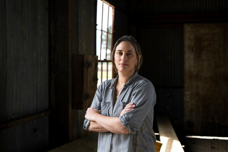 Hallie Shoffner, pictured on April 11, 2025, in this building that housed her family farm's cotton gin in Shoffner, Ark., formally announced her U. S. Senate bid.